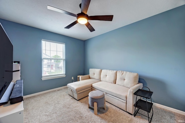 3063 N Natasha Dr, Bloomington, IN 47404 - living room with carpet flooring, ceiling fan, and baseboards