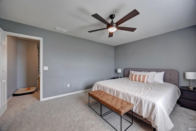 3063 N Natasha Dr, Bloomington, IN 47404 - carpeted bedroom featuring baseboards and ceiling fan