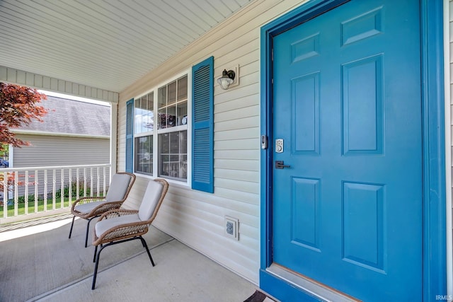 3063 N Natasha Dr, Bloomington, IN 47404 - property entrance with a porch