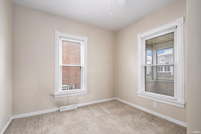 715 W 7th St, Mishawaka, IN 46544 - carpeted empty room with baseboards