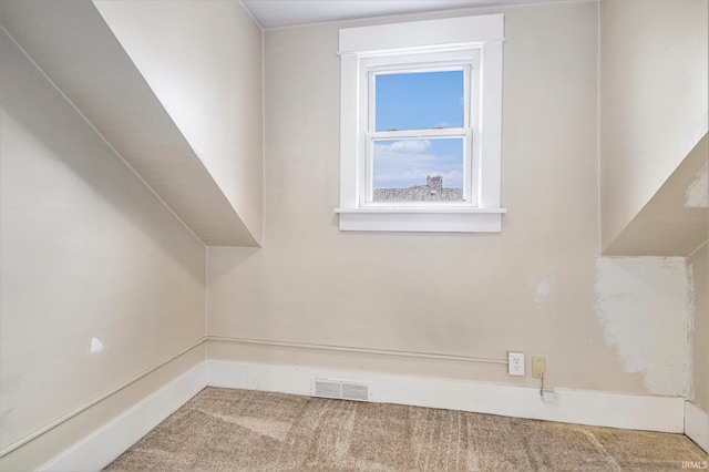 715 W 7th St, Mishawaka, IN 46544 - additional living space with carpet floors and baseboards