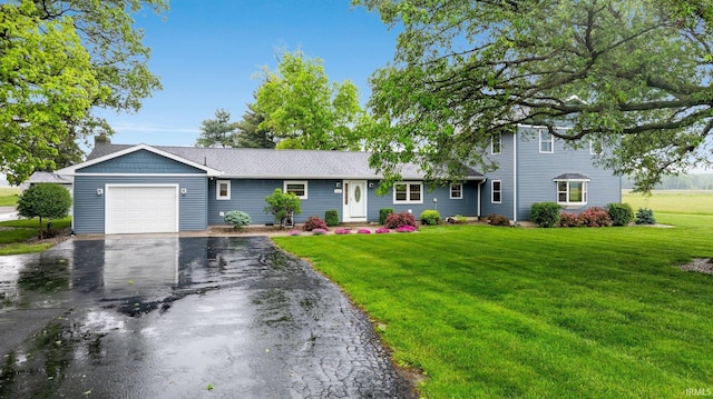914 W 300 S, Bluffton, IN 46714 - ranch-style home featuring a garage, asphalt driveway, and a front yard