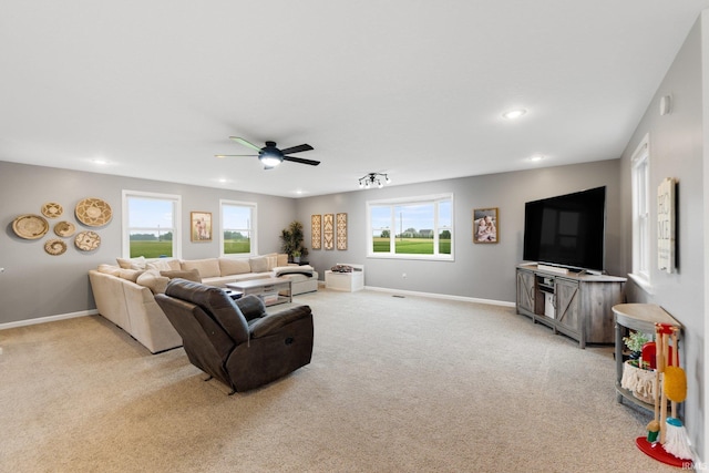 914 W 300 S, Bluffton, IN 46714 - living room with light colored carpet, a ceiling fan, plenty of natural light, baseboards, and recessed lighting
