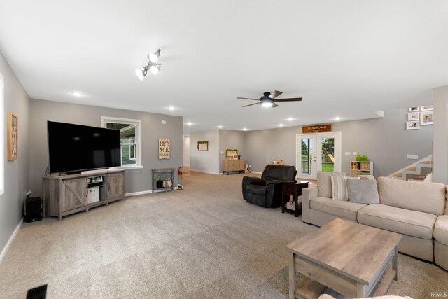 914 W 300 S, Bluffton, IN 46714 - living room with stairs, carpet flooring, a ceiling fan, baseboards, and recessed lighting