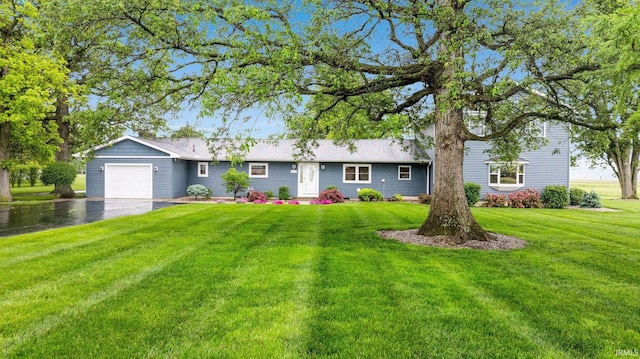 914 W 300 S, Bluffton, IN 46714 - view of front facade with an attached garage, driveway, and a front lawn