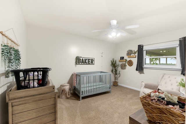 914 W 300 S, Bluffton, IN 46714 - bedroom featuring carpet flooring, baseboards, a nursery area, and a ceiling fan