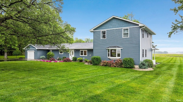 914 W 300 S, Bluffton, IN 46714 - view of front of house featuring a front yard and a garage
