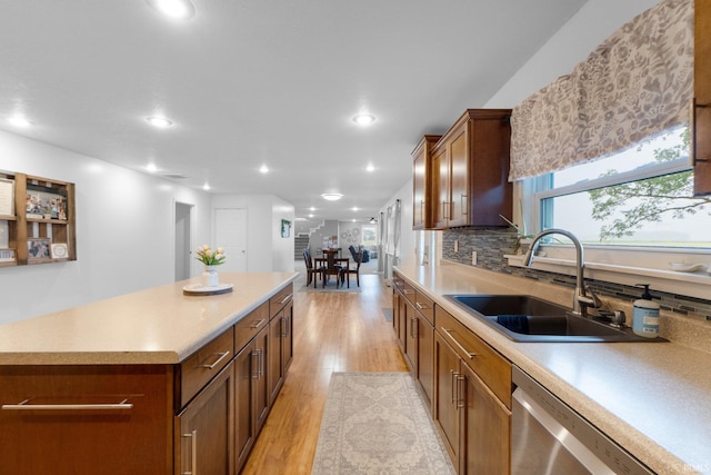 914 W 300 S, Bluffton, IN 46714 - kitchen with a sink, stainless steel dishwasher, light wood-type flooring, recessed lighting, and a kitchen island