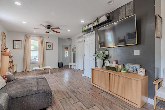 21 Noble St, Wabash, IN 46992 - living room featuring wood finished floors, recessed lighting, ceiling fan, and baseboards