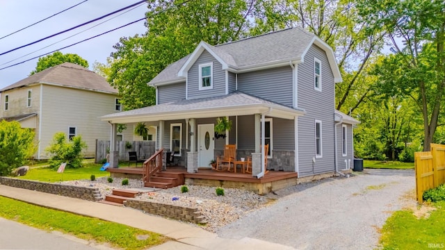 21 Noble St, Wabash, IN 46992 - view of front facade with a porch, roof with shingles, and central AC unit