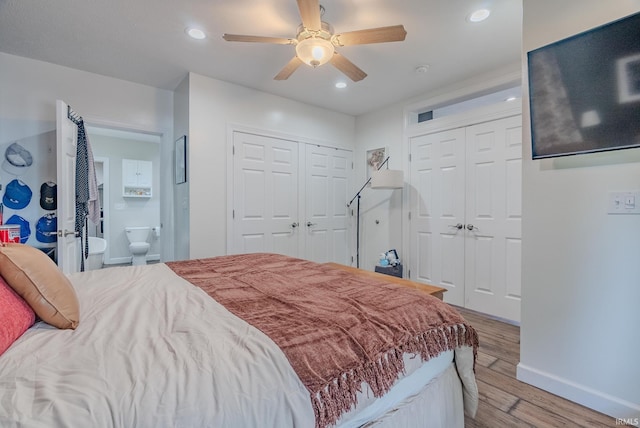 21 Noble St, Wabash, IN 46992 - bedroom featuring light wood-type flooring, recessed lighting, baseboards, multiple closets, and ceiling fan