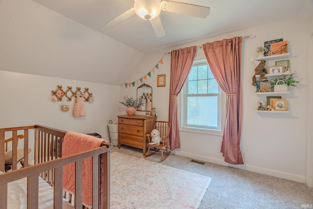 21 Noble St, Wabash, IN 46992 - bedroom featuring light carpet, vaulted ceiling, a crib, a ceiling fan, and baseboards