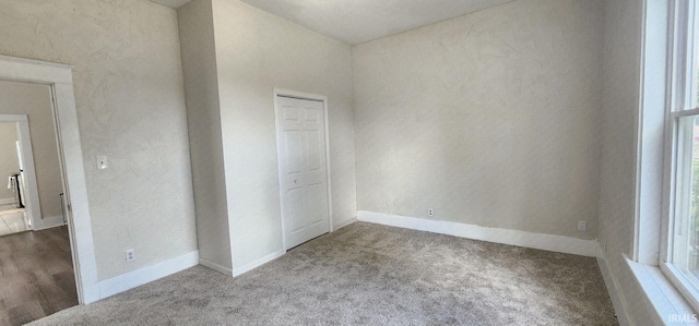 1237 E Illinois St, Evansville, IN 47711 - empty room featuring carpet and baseboards