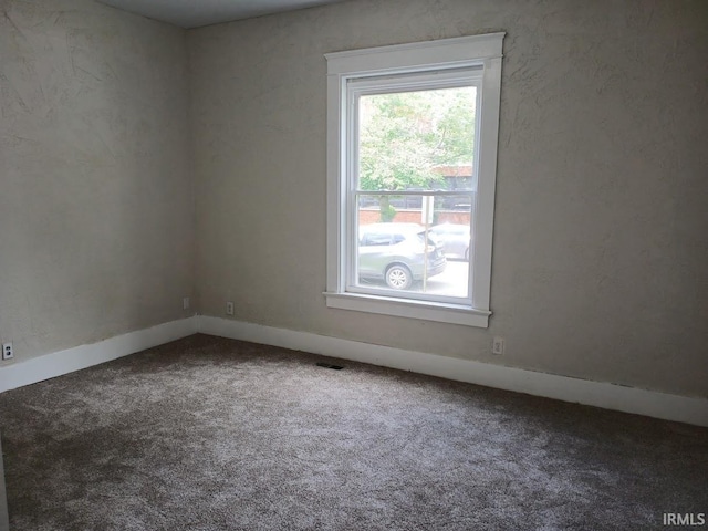 1237 E Illinois St, Evansville, IN 47711 - carpeted spare room featuring baseboards