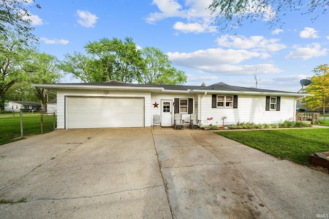 18377 Dunn Rd, South Bend, IN 46637 - single story home featuring driveway, an attached garage, and a front lawn