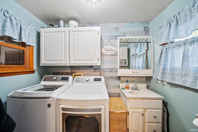 18377 Dunn Rd, South Bend, IN 46637 - washroom with washing machine and dryer and cabinet space
