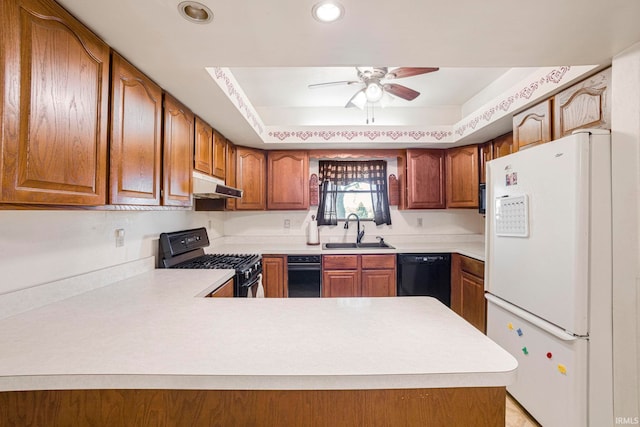 4051 S 700 E, Walkerton, IN 46574 - kitchen with black appliances, a sink, under cabinet range hood, light countertops, and recessed lighting