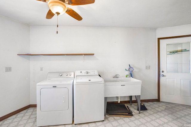 4051 S 700 E, Walkerton, IN 46574 - laundry area with light flooring, washer and clothes dryer, a ceiling fan, and baseboards