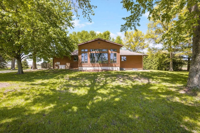 4051 S 700 E, Walkerton, IN 46574 - rear view of property featuring a lawn