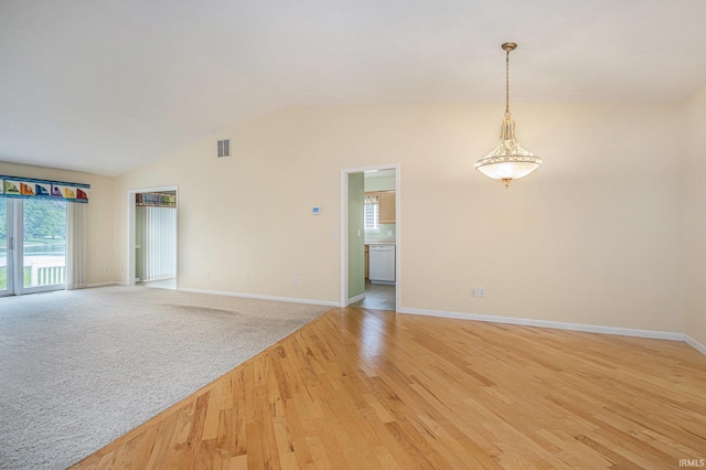 18586 Pauls Way S, Bend, IN 46637 - spare room with light wood-style flooring, baseboards, and vaulted ceiling