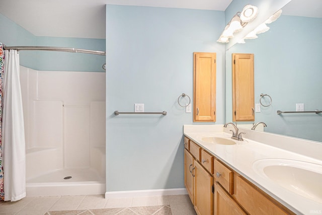 18586 Pauls Way S, Bend, IN 46637 - full bath with double vanity, baseboards, a shower with curtain, and tile patterned flooring