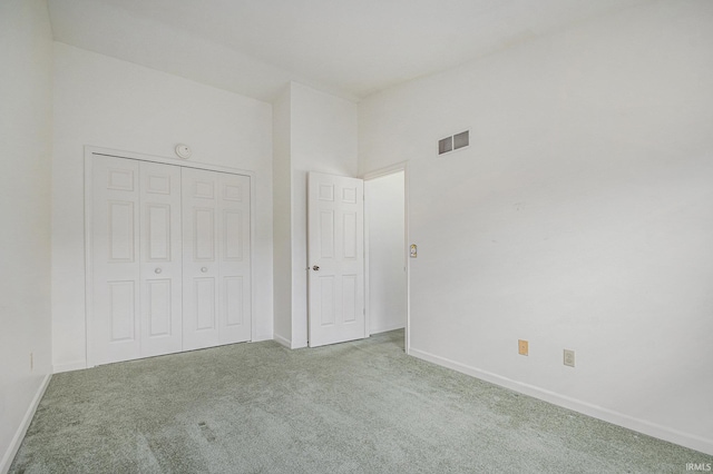5843 Durham Ct, South Bend, IN 46614 - unfurnished bedroom with carpet floors, baseboards, and a closet