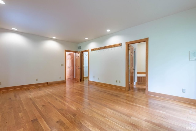 2557 S Smith Rd, Bloomington, IN 47401 - spare room featuring light wood finished floors, recessed lighting, and baseboards