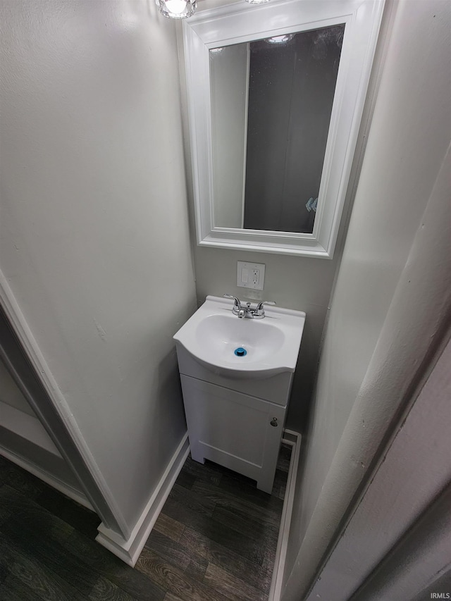 826 E Jefferson Blvd, Fort Wayne, IN 46803 - bathroom featuring wood finished floors and vanity