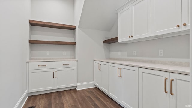 447 E Basalt Dr, Huntertown, IN 46748 - kitchen featuring open shelves, dark wood-style flooring, white cabinetry, light countertops, and baseboards