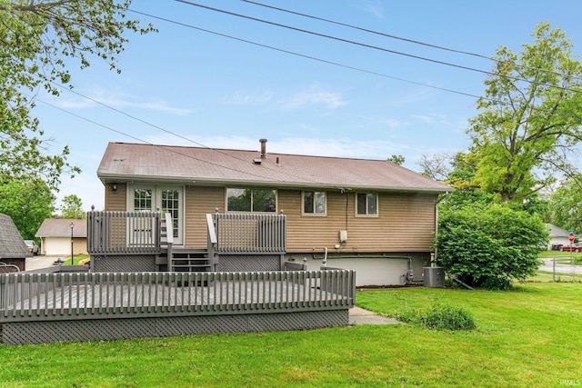 1024 Tulip Tree Rd, Fort Wayne, IN 46825 - rear view of house featuring a deck, a lawn, and central AC unit