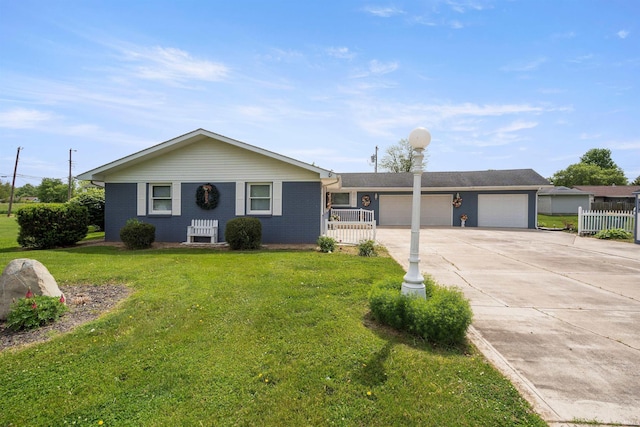 404 S Maple St, Greentown, IN 46936 - ranch-style house with a garage, concrete driveway, and brick siding