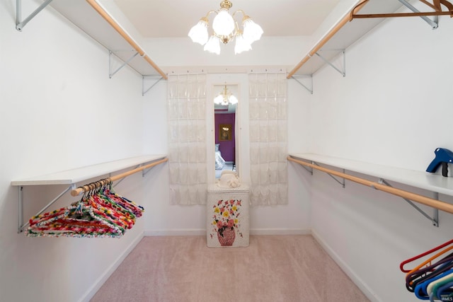 404 S Maple St, Greentown, IN 46936 - spacious closet featuring a chandelier and carpet floors