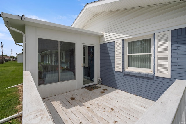 404 S Maple St, Greentown, IN 46936 - wooden terrace with a yard and a sunroom