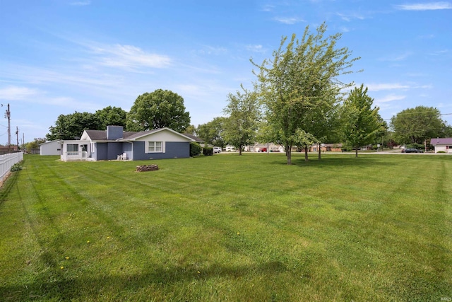 404 S Maple St, Greentown, IN 46936 - view of yard featuring an outdoor fire pit