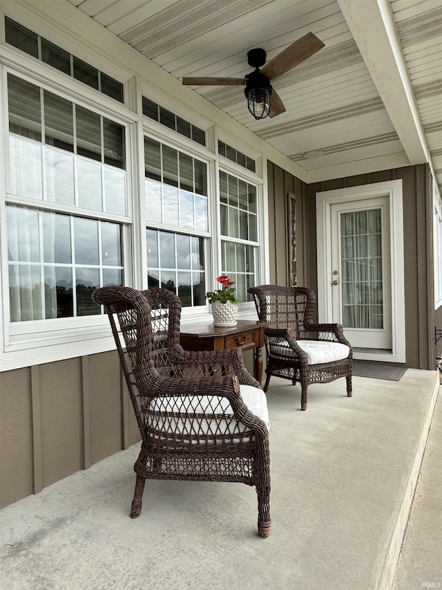 4968 W Campbell St, North Judson, IN 46366 - covered porch featuring ceiling fan