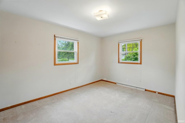 5415 Cranston Ave, Fort Wayne, IN 46835 - carpeted empty room with a baseboard heating unit and baseboards