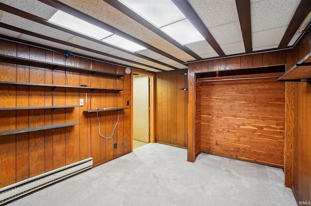 5415 Cranston Ave, Fort Wayne, IN 46835 - finished basement featuring a baseboard heating unit, carpet floors, and wood walls
