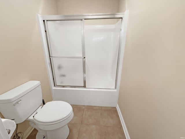 6359 E County Road 1900 N, Dale, IN 47523 - bathroom featuring toilet, combined bath / shower with glass door, tile patterned flooring, and baseboards