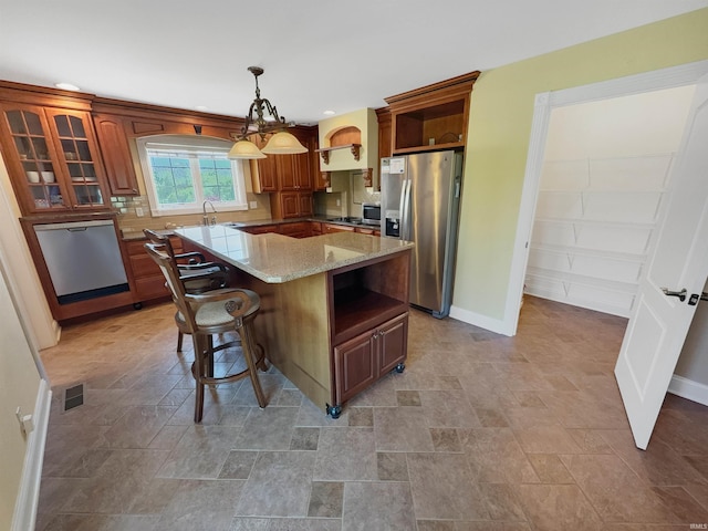 6359 E County Road 1900 N, Dale, IN 47523 - kitchen featuring appliances with stainless steel finishes, baseboards, open shelves, stone finish flooring, and recessed lighting