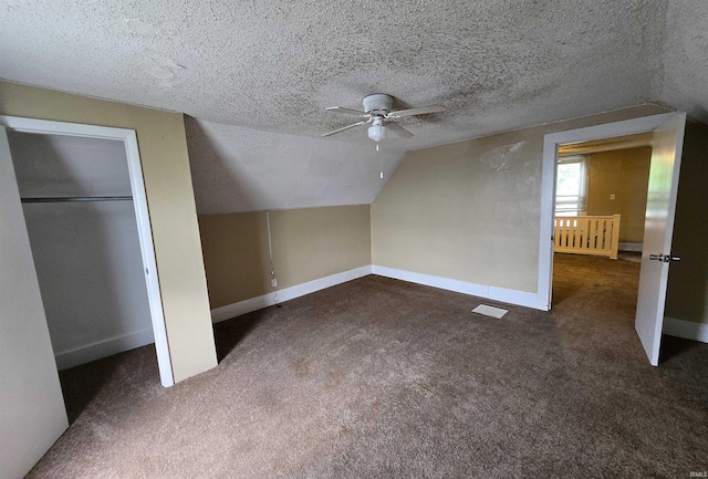 3403 Corbierre Ave, Evansville, IN 47712 - additional living space featuring ceiling fan, carpet flooring, lofted ceiling, baseboards, and a textured ceiling
