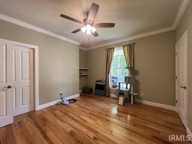 3638 N 1500 W Rd, Linton, IN 47441 - unfurnished bedroom with wood finished floors, ornamental molding, baseboards, and a ceiling fan
