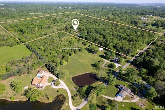 3638 N 1500 W Rd, Linton, IN 47441 - aerial overview of property's location featuring a forest, property boundaries highlighted, and a large body of water