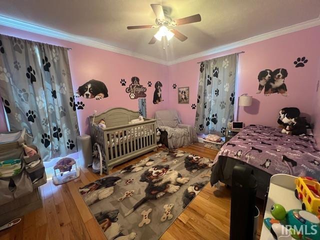 3638 N 1500 W Rd, Linton, IN 47441 - bedroom with wood finished floors, crown molding, and a ceiling fan
