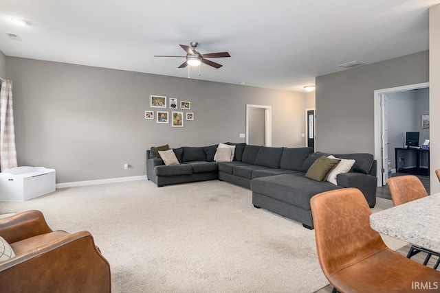 12475 Speranza Dr, Fort Wayne, IN 46818 - carpeted living room with ceiling fan and baseboards