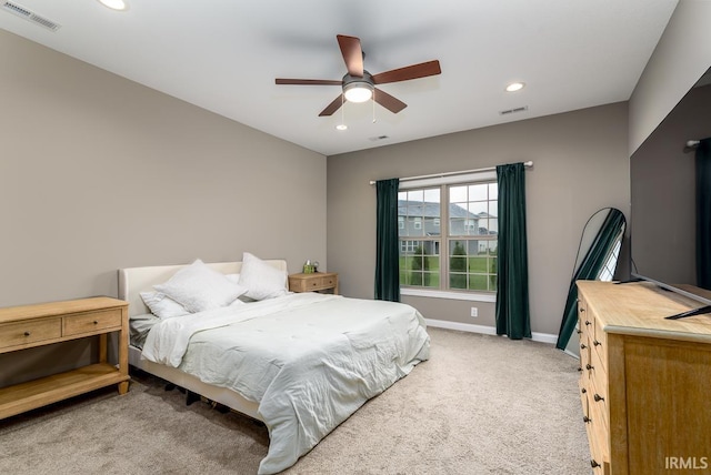 12475 Speranza Dr, Fort Wayne, IN 46818 - bedroom with light colored carpet, recessed lighting, baseboards, and ceiling fan