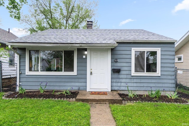 1510 W 4th St, Fort Wayne, IN 46808 - bungalow-style house featuring a chimney and roof with shingles