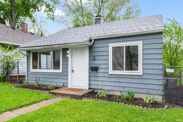 1510 W 4th St, Fort Wayne, IN 46808 - bungalow-style home with a chimney and a shingled roof