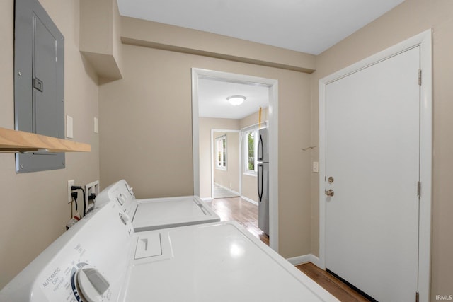 1510 W 4th St, Fort Wayne, IN 46808 - washroom featuring independent washer and dryer, wood finished floors, and baseboards