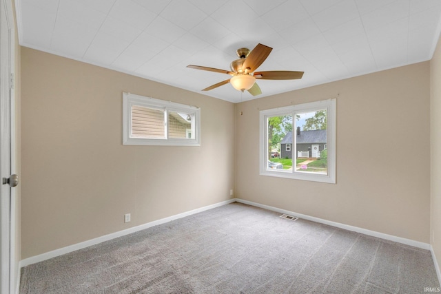 1510 W 4th St, Fort Wayne, IN 46808 - empty room with carpet floors, baseboards, and a ceiling fan