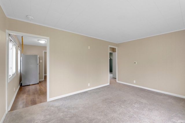 1510 W 4th St, Fort Wayne, IN 46808 - spare room with carpet floors, crown molding, a smoke detector, and baseboards